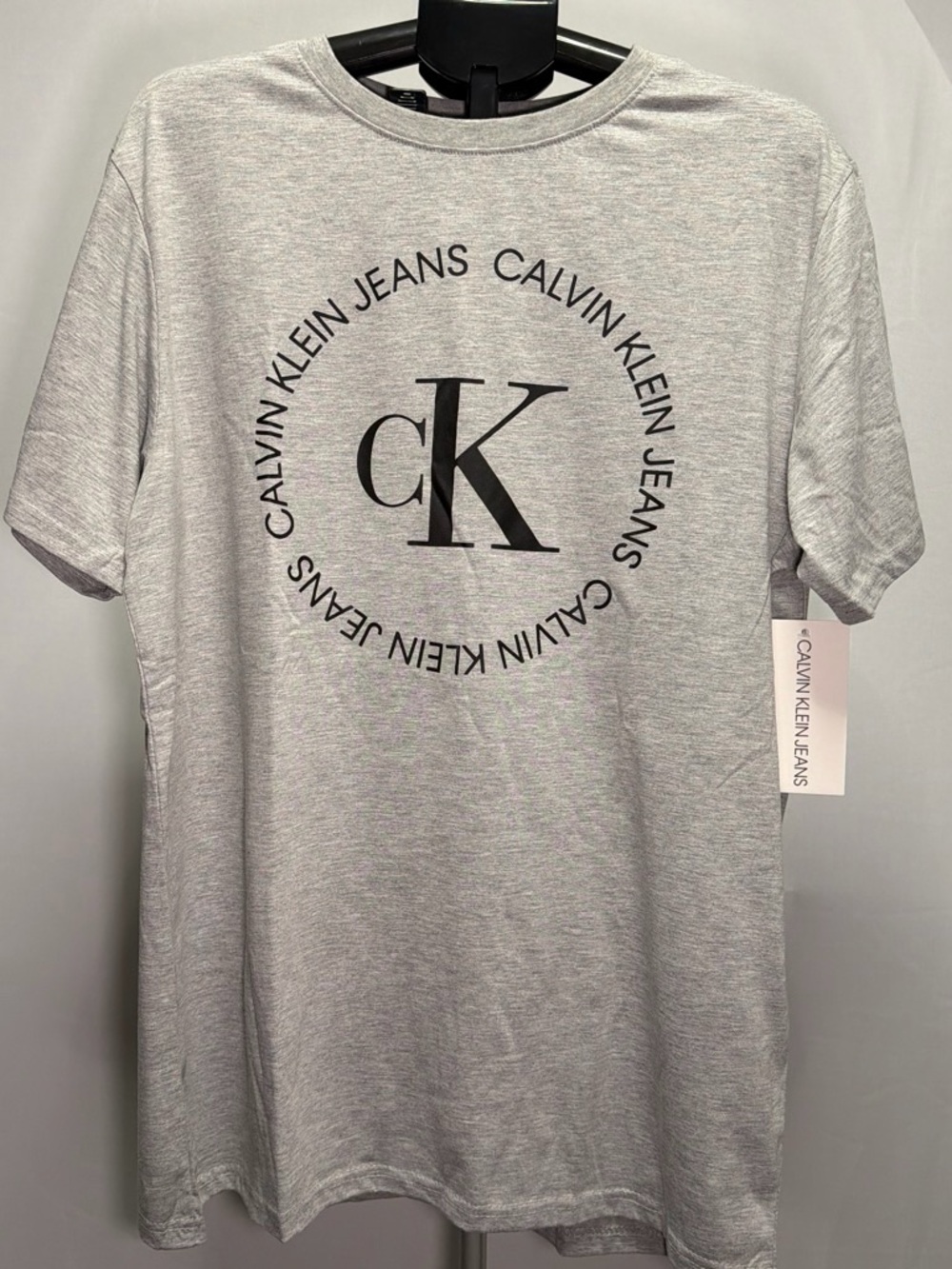 Calvin Klein Jeans Light Gray Short Sleeve Tee with Black CK Circle Logo